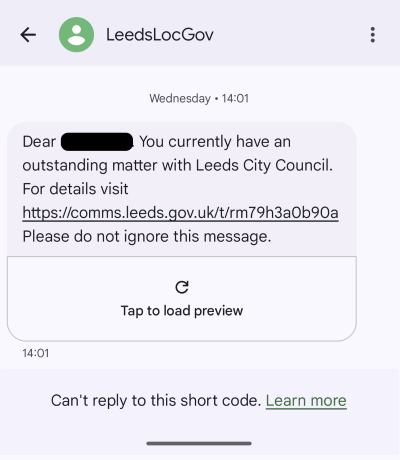 example text message showing the sender as 'LeedsLocGov' with the text stating 'Dear your name, you currently have an outstanding matter with Leeds City Council. For details visit, then a hyperlink, then please do not ignore this message'