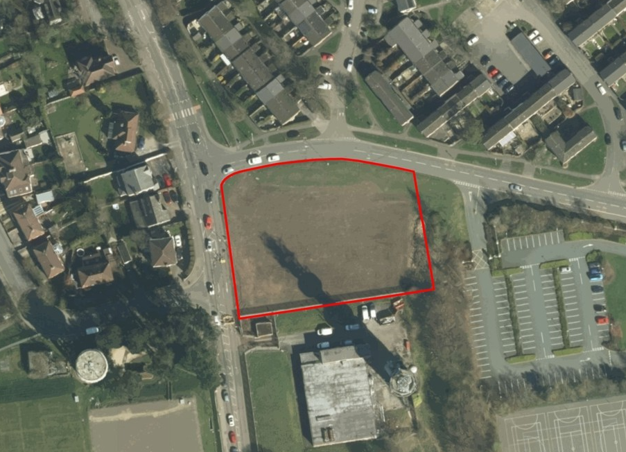 Aerial view of square land with red outline